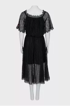 Lace dress decorated with embroidery