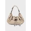 Leather hobo bag with drawstrings