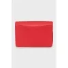 Rectangular crossbody bag in leather, with tag