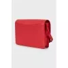 Rectangular crossbody bag in leather, with tag