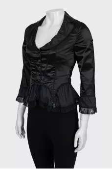 Fitted jacket decorated with lace