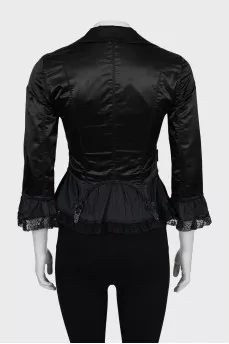 Fitted jacket decorated with lace