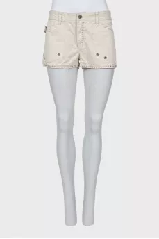 Denim shorts with metallic rhinestones