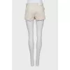 Denim shorts with metallic rhinestones