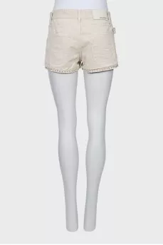 Denim shorts with metallic rhinestones