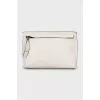 Leather clutch with embossed print