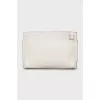 Leather clutch with embossed print
