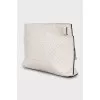 Leather clutch with embossed print