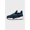Textile sneakers decorated with rhinestones