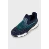Textile sneakers decorated with rhinestones