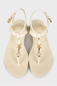 Rubber sandals with gold hardware