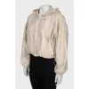 Cropped windbreaker with tag