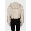 Cropped windbreaker with tag