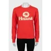 Red sweatshirt with embossed print