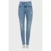 Ripped skinny jeans