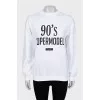 Sweatshirt with black print and tag