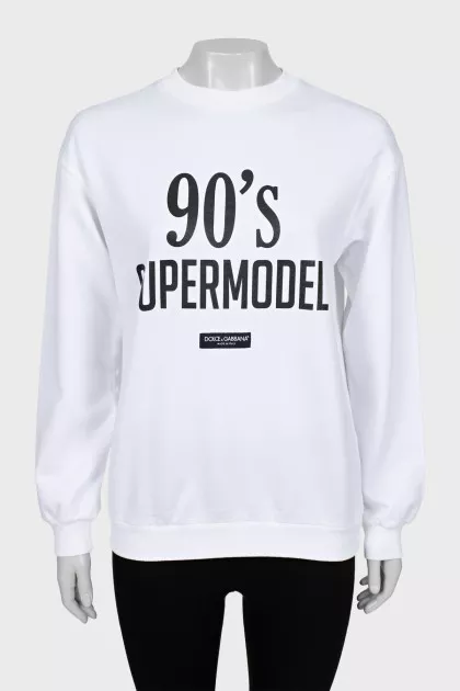Sweatshirt with black print and tag