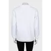 Sweatshirt with black print and tag