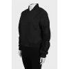 Bomber jacket with draped sleeves