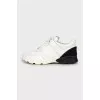 Leather sneakers with contrast heel