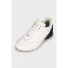 Leather sneakers with contrast heel