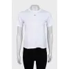 T-shirt with metal logo and tag
