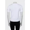 T-shirt with metal logo and tag