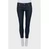 Cropped jeans with zips at the bottom