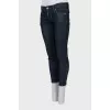 Cropped jeans with zips at the bottom