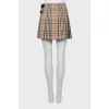 Woolen mini skirt in signature print