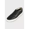Men's black leather sneakers