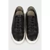Men's black leather sneakers