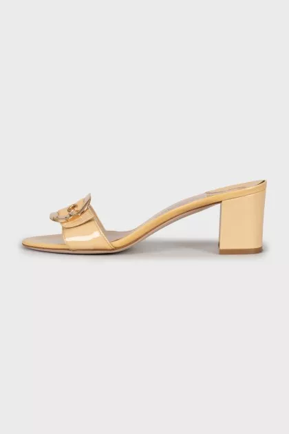 Leather slides with gold decoration