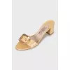 Leather slides with gold decoration