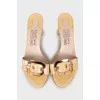 Leather slides with gold decoration