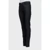 Jeans with contrast seams and tag