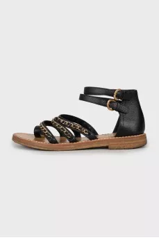 Leather sandals decorated with chains