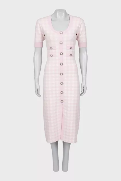 Plaid dress decorated with buttons