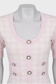 Plaid dress decorated with buttons
