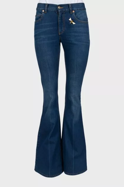 Flared jeans decorated with embroidery