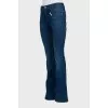 Flared jeans decorated with embroidery