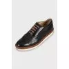 Leather brogues with brown laces