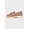 Leather shoes with perforations and fringes