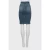 Denim skirt decorated with buttons
