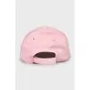 Pink cap with tag