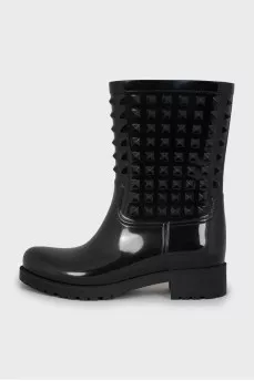 Rubber boots decorated with spikes