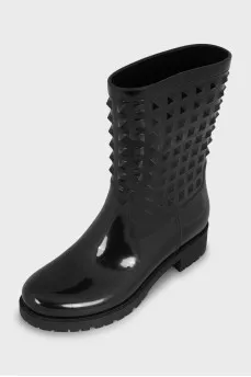 Rubber boots decorated with spikes