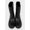 Rubber boots decorated with spikes