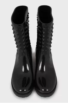 Rubber boots decorated with spikes