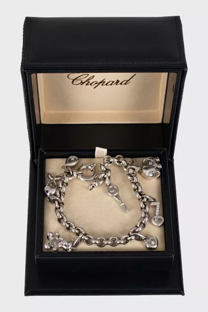 White gold bracelet with charms